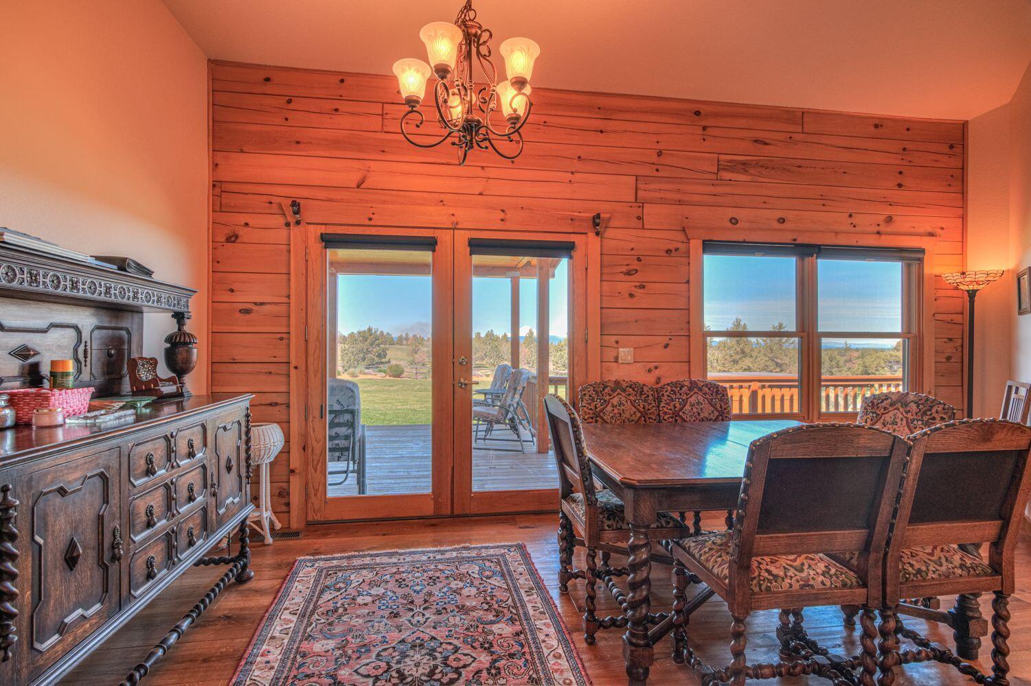 10000 Southwest Lyons Drive Culver, OR 97734 - Photo 26 of 90 a view of a dining room with furniture window and wooden floor