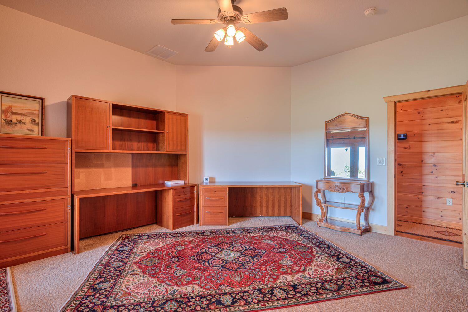 10000 Southwest Lyons Drive Culver, OR 97734 - Photo 28 of 90 a bedroom with a bed and dresser