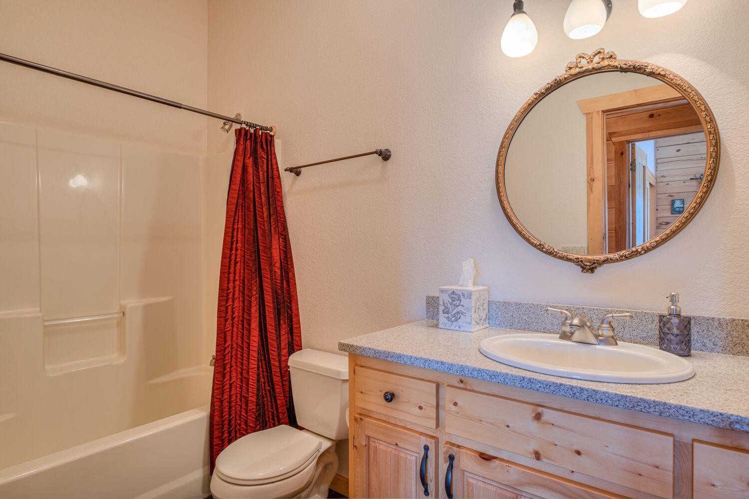 10000 Southwest Lyons Drive Culver, OR 97734 - Photo 38 of 90 a bathroom with a granite countertop sink toilet and a mirror