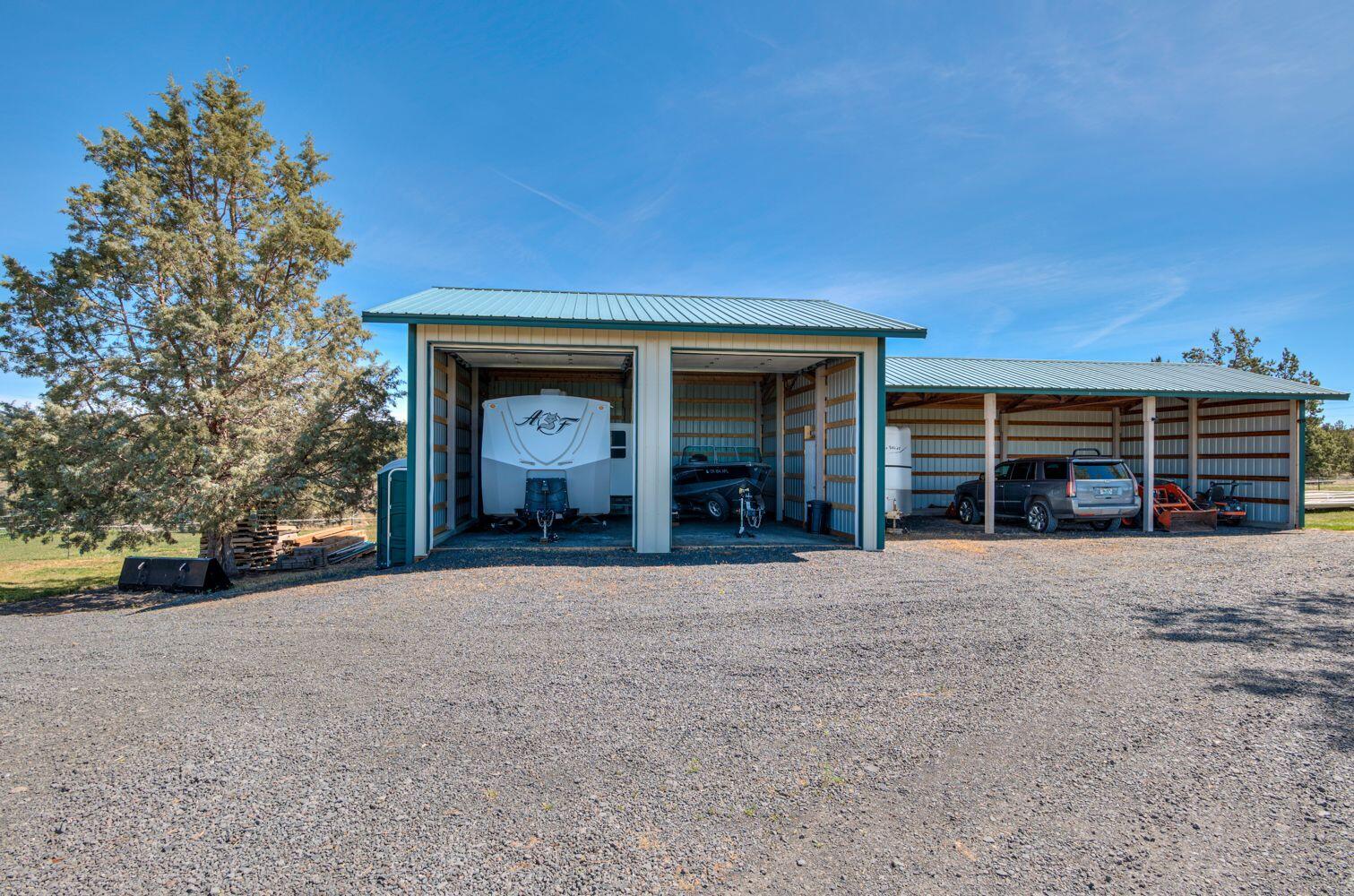 10000 Southwest Lyons Drive Culver, OR 97734 - Photo 80 of 90 a view of a house with a outdoor space and balcony