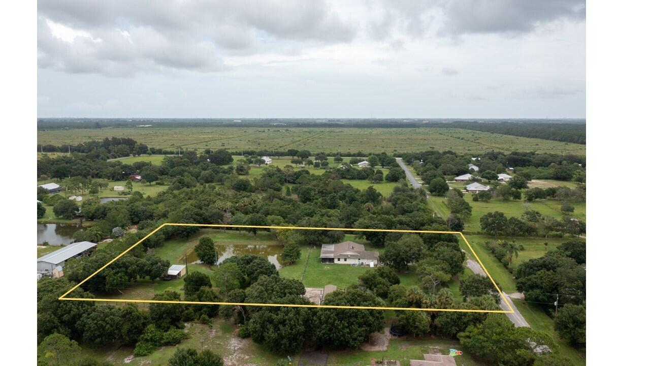 10950 Schwab Road Fort Pierce, FL 34945 - Photo 8 of 61 Side view marked jpg