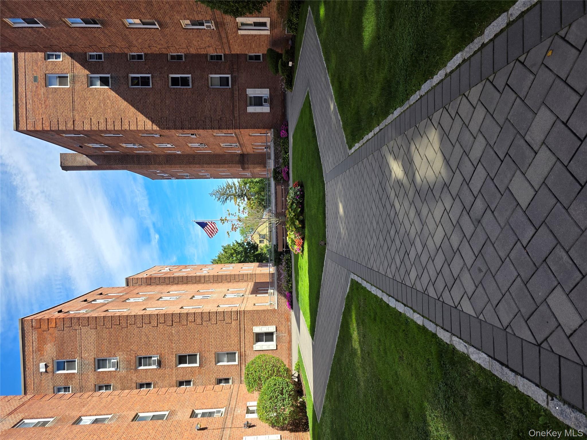 front view of a building with a yard