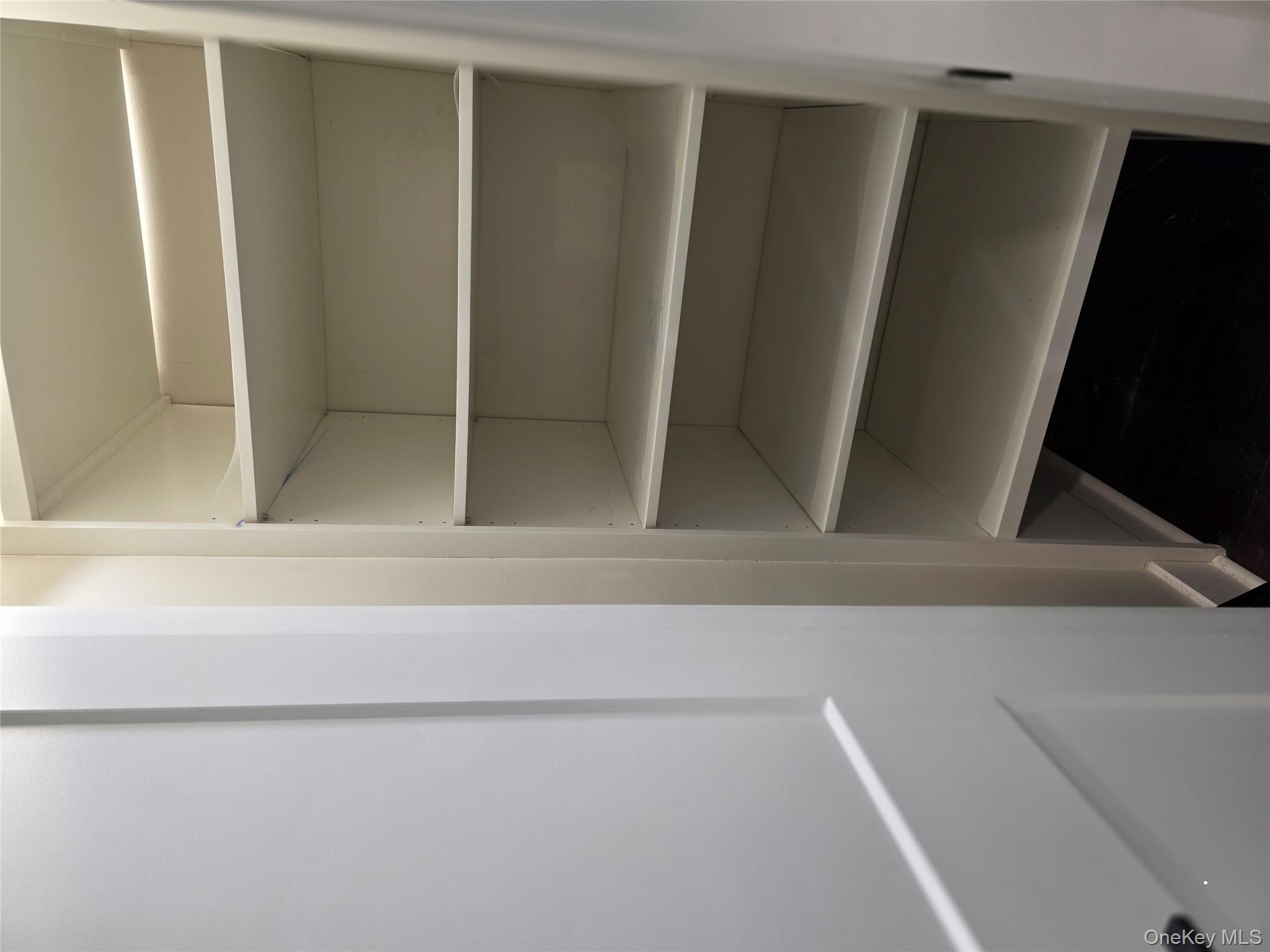 70 Locust Avenue, Unit B505 New Rochelle, NY 10801 - Photo 10 of 14 a view of walk in closet with empty racks