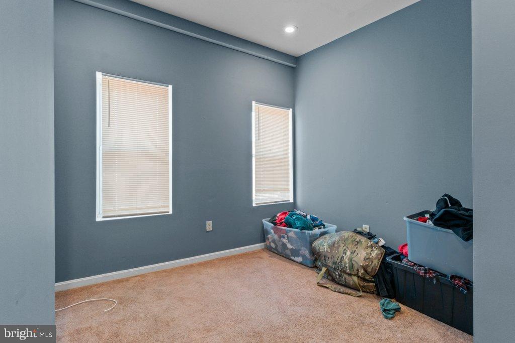 1309 Kuper Place Baltimore, MD 21223 - Photo 13 of 20 a livingroom with toys and a chandelier