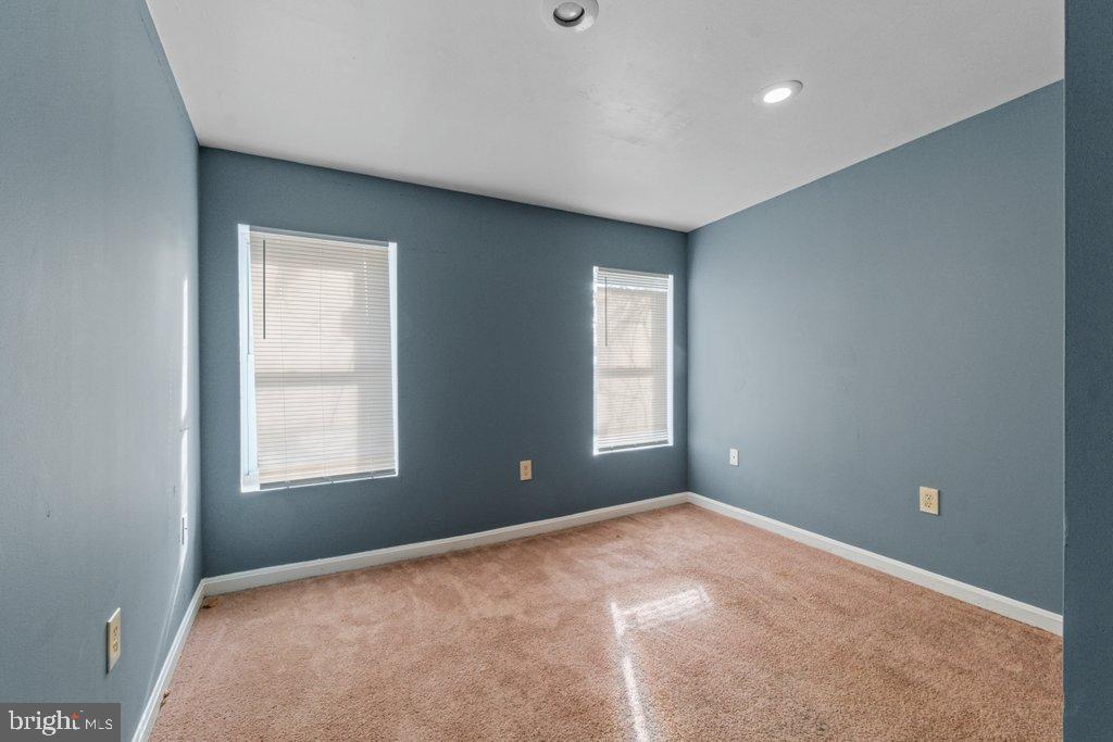 1309 Kuper Place Baltimore, MD 21223 - Photo 16 of 20 a view of an empty room with a window