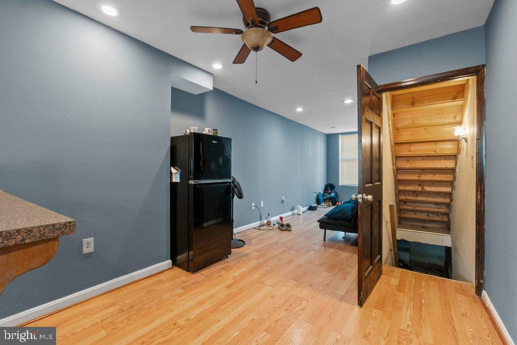 1309 Kuper Place Baltimore, MD 21223 - Photo 7 of 20 a bed room with a bed and furniture