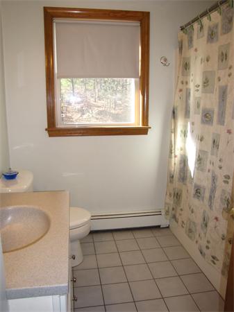 99 Moosehill Road Walpole, MA 02032 - Photo 18 of 22 a bathroom with a granite countertop toilet and a sink