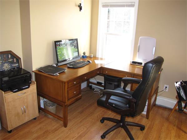 99 Moosehill Road Walpole, MA 02032 - Photo 20 of 22 a view of a workspace with furniture and a window