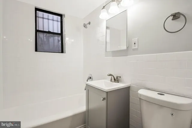 a bathroom with a sink and a toilet