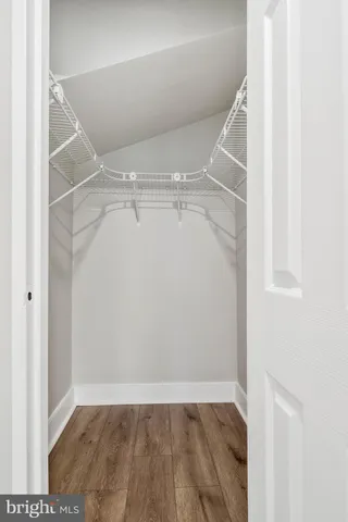 a view of an empty walk in closet