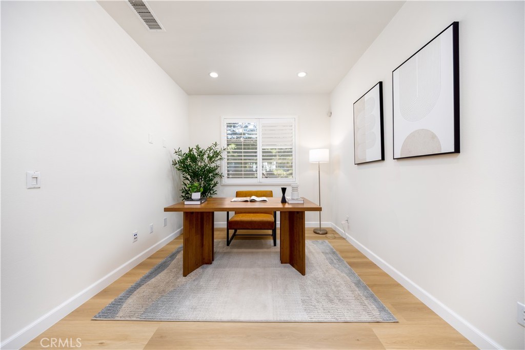 154 Firefly Irvine, CA 92618 - Photo 13 of 34 a view of a room with wooden floor and furniture