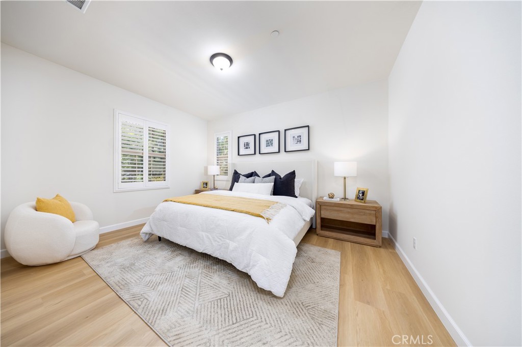 154 Firefly Irvine, CA 92618 - Photo 16 of 34 a bedroom with a bed and window