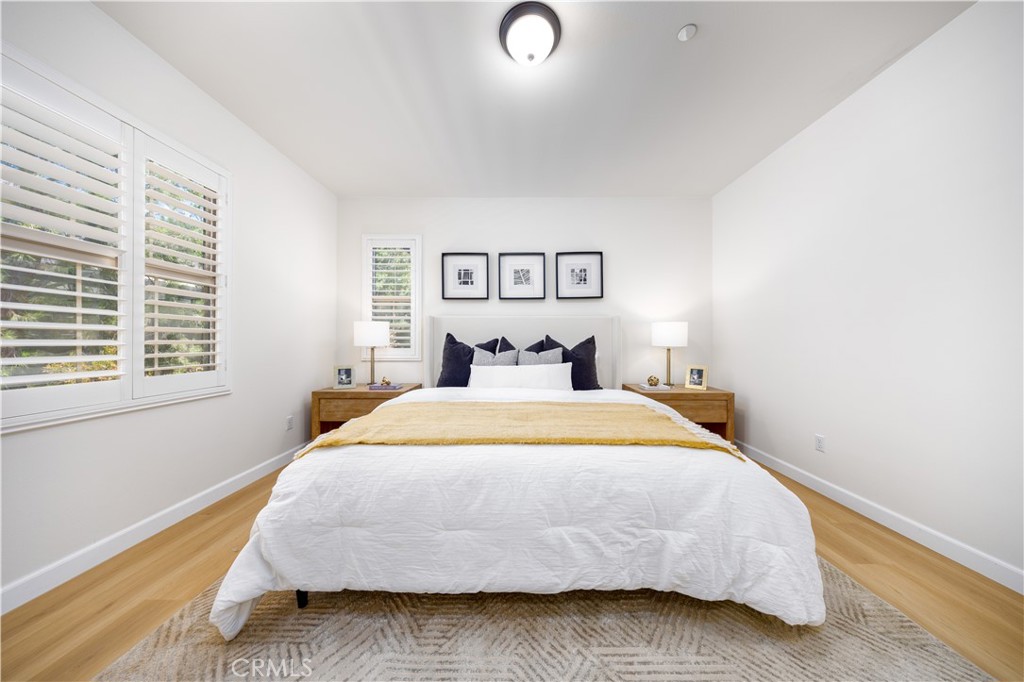154 Firefly Irvine, CA 92618 - Photo 17 of 34 a bedroom with a bed and window