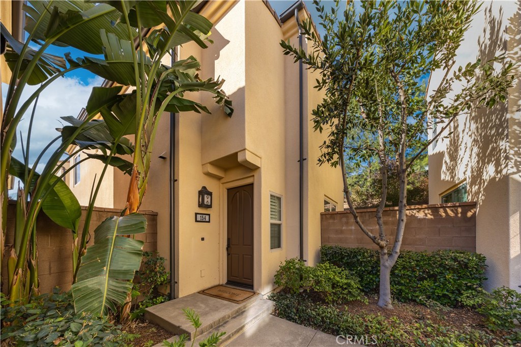 154 Firefly Irvine, CA 92618 - Photo 2 of 34 a view of a house with a tree