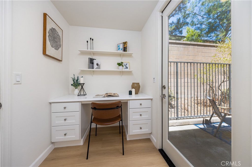 154 Firefly Irvine, CA 92618 - Photo 10 of 34 a view of cabinets a sink and a window in a room