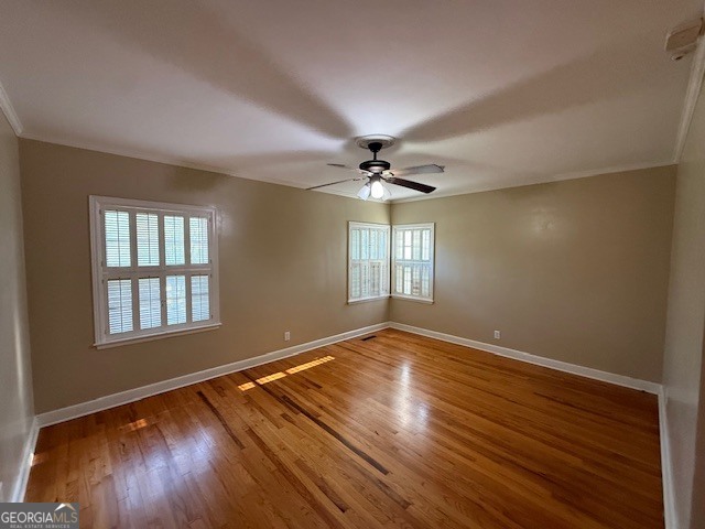 1221 Ridge Avenue North Tifton, GA 31794 - Photo 16 of 29 a view of an empty room with wooden floor and a window