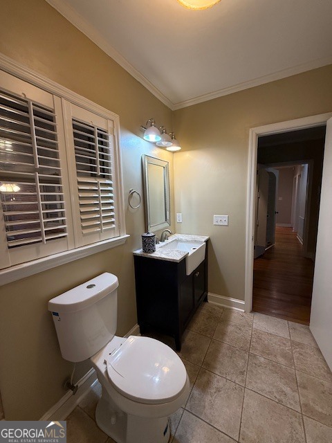 1221 Ridge Avenue North Tifton, GA 31794 - Photo 20 of 29 a bathroom with a toilet sink and mirror