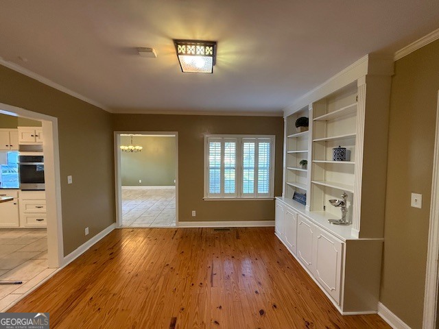 1221 Ridge Avenue North Tifton, GA 31794 - Photo 7 of 29 wooden floor in an empty room with a window