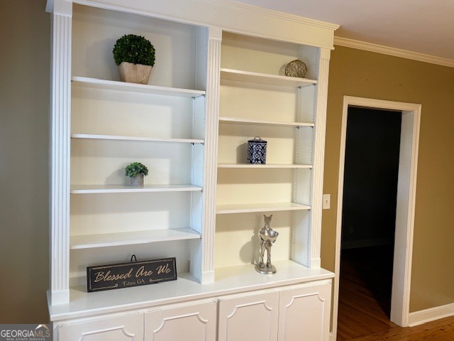 1221 Ridge Avenue North Tifton, GA 31794 - Photo 8 of 29 a cabinet with a vase of flowers on it