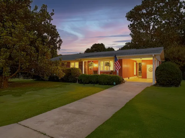 a view of a house with garden