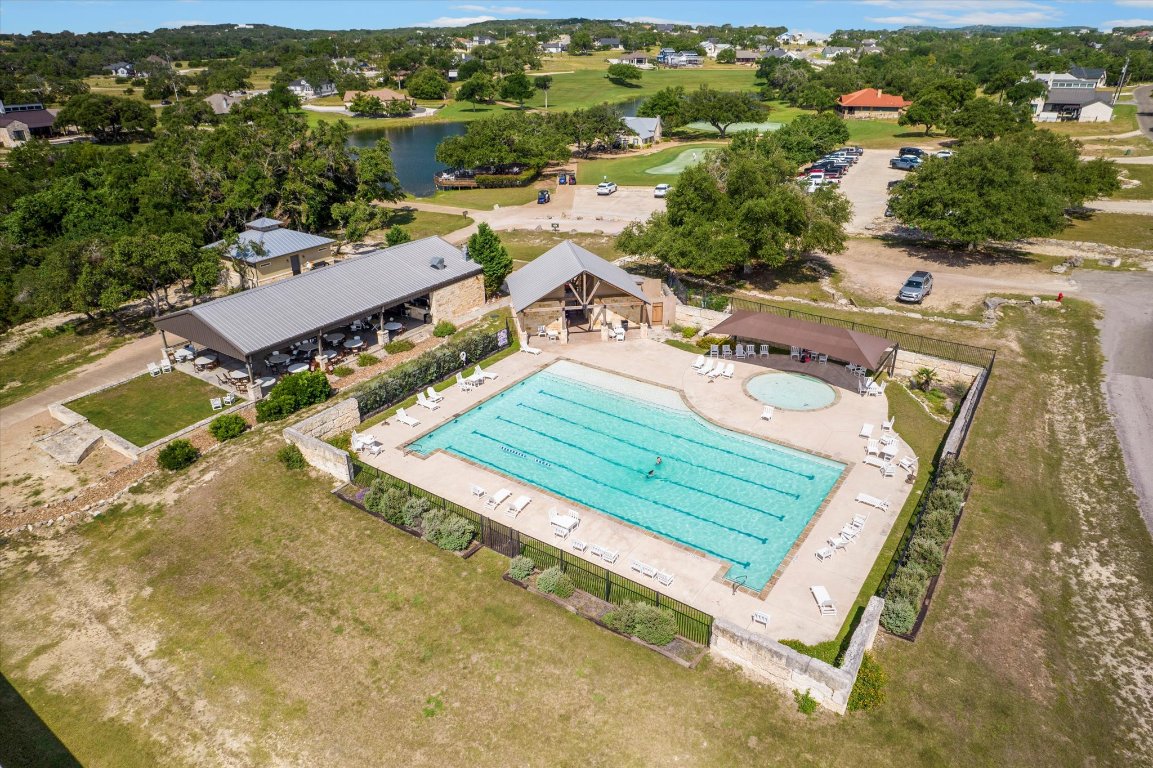 121 South Jesse Stiff Blanco, TX 78606 - Photo 9 of 17 an aerial view of a house with a garden