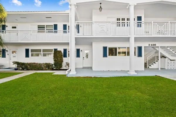 a big house with a big yard and more windows