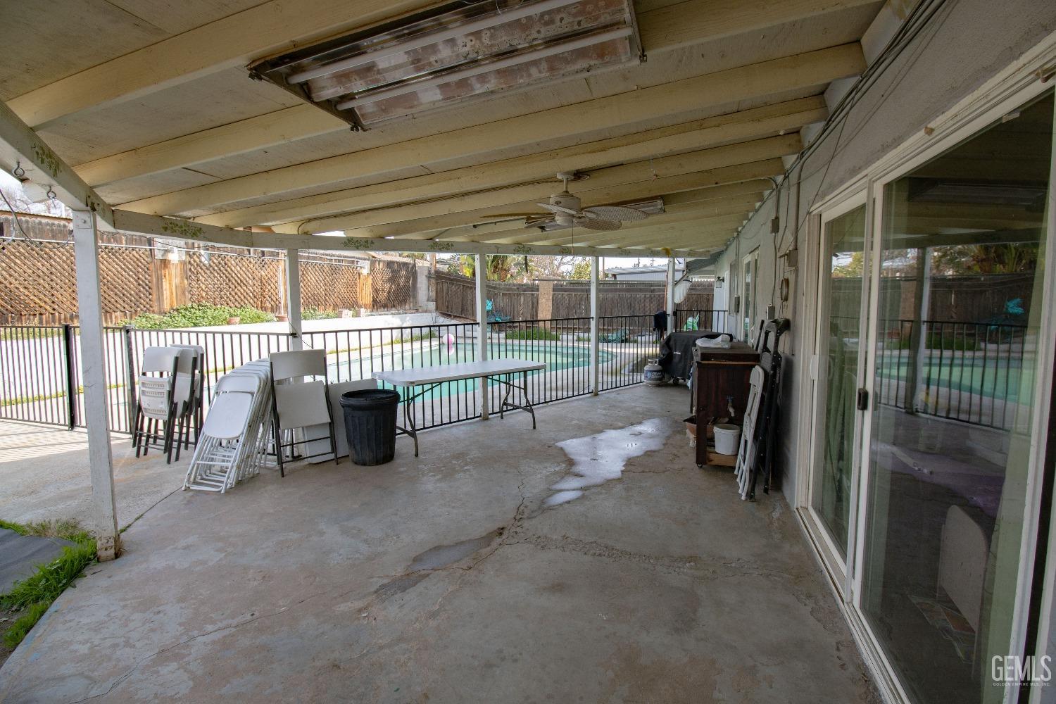 Undisclosed Address Bakersfield, CA 93306 - Photo 6 of 9 a view of a room with glass door
