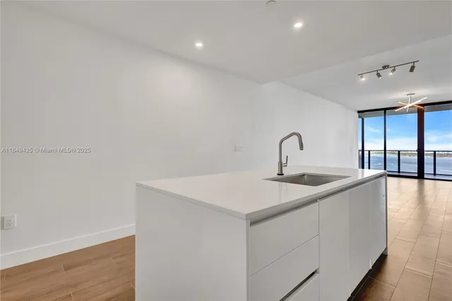 a terrace of a house with outdoor seating