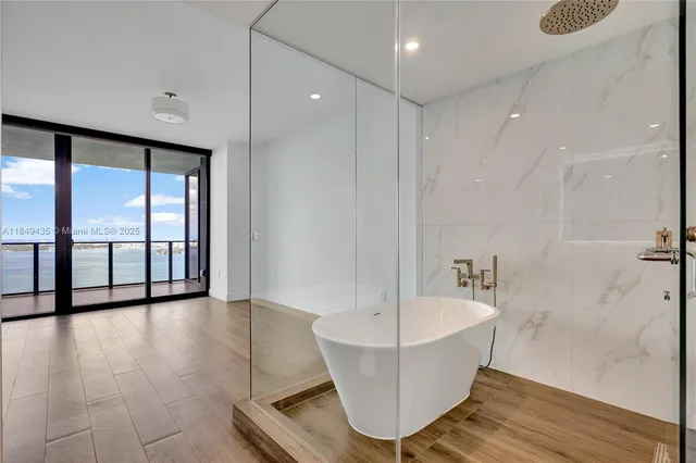 a view of an outdoor sitting area with swimming pool