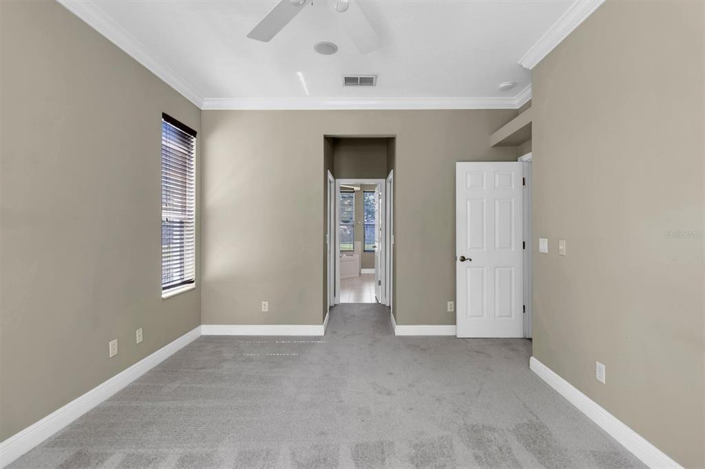 10121 Porch Street New Port Richey, FL 34655 - Photo 23 of 57 an empty room with windows and closet