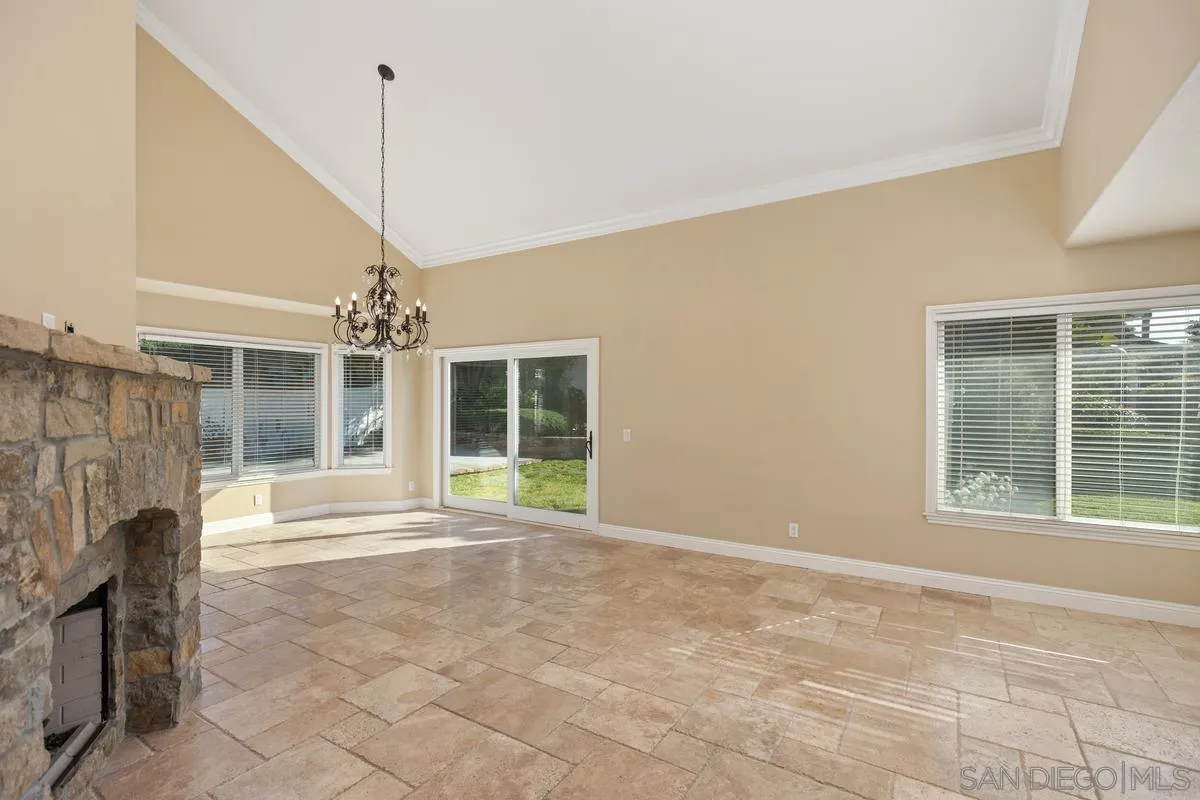 2002 Paseo Laro San Clemente, CA 92673 - Photo 11 of 37 a view of an empty room with a fireplace and a window