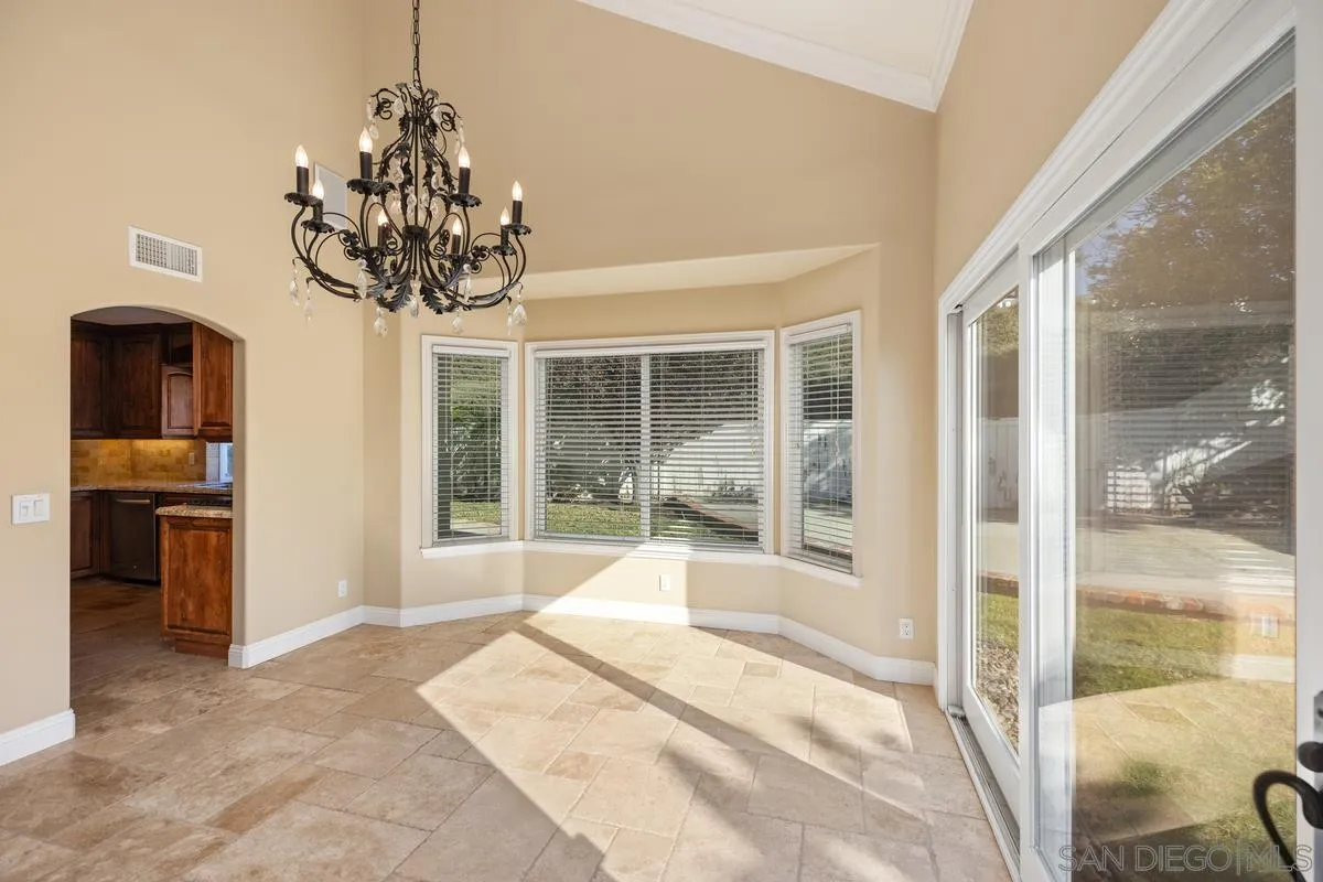 2002 Paseo Laro San Clemente, CA 92673 - Photo 13 of 37 a very nice looking room with a large window and chandelier
