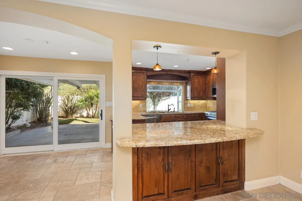 2002 Paseo Laro San Clemente, CA 92673 - Photo 17 of 37 a bathroom with a granite countertop sink and a mirror