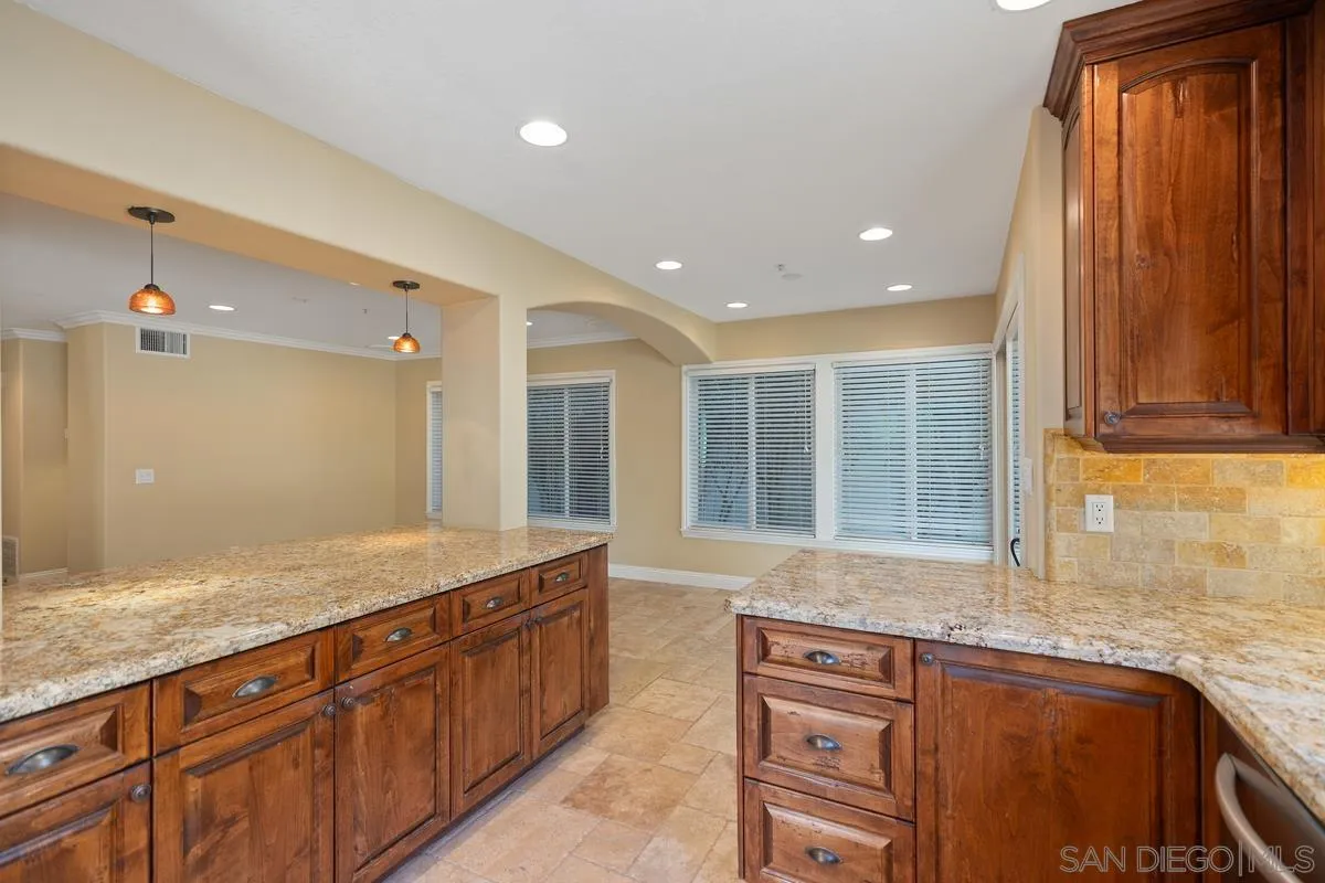 2002 Paseo Laro San Clemente, CA 92673 - Photo 19 of 37 a kitchen with sink refrigerator and window