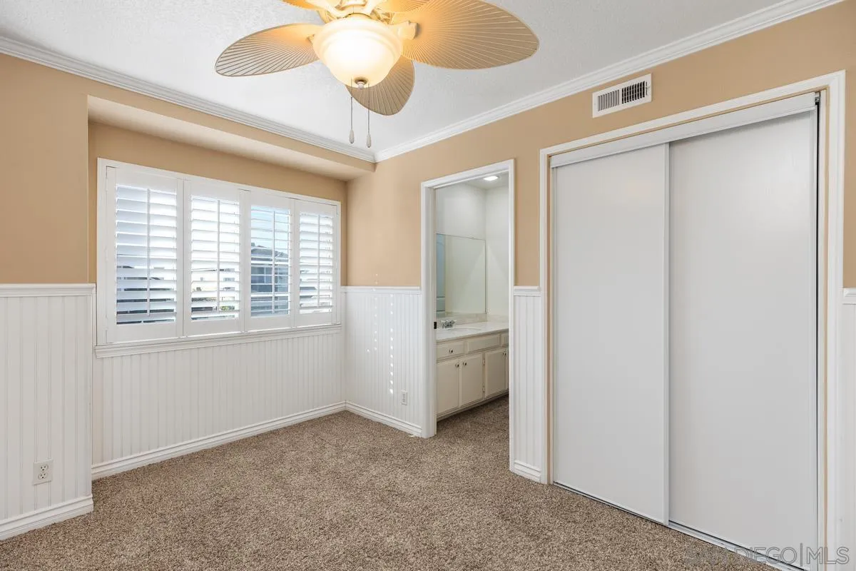 2002 Paseo Laro San Clemente, CA 92673 - Photo 26 of 37 a view of a livingroom with a ceiling fan and window