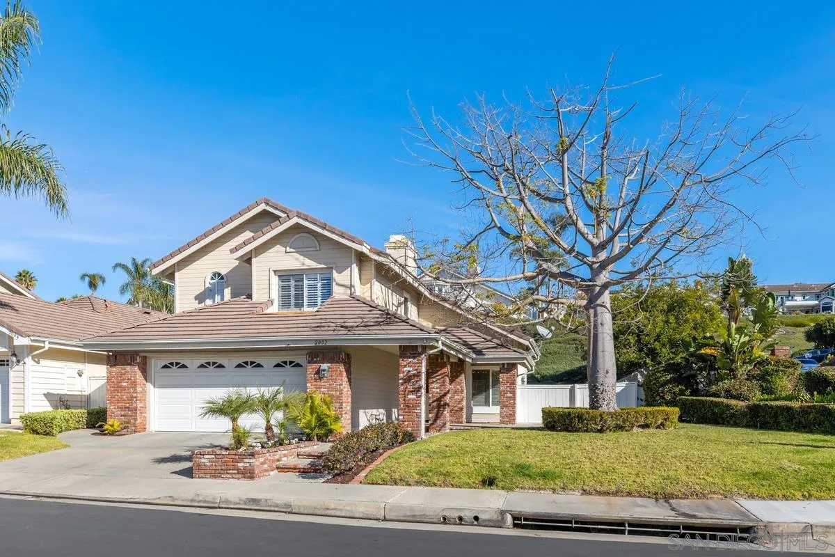 2002 Paseo Laro San Clemente, CA 92673 - Photo 4 of 37 front view of a house with a small yard