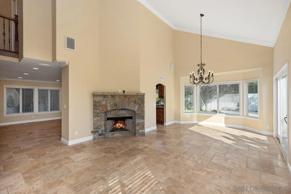 2002 Paseo Laro San Clemente, CA 92673 - Photo 9 of 37 a view of an empty room with fireplace and a window