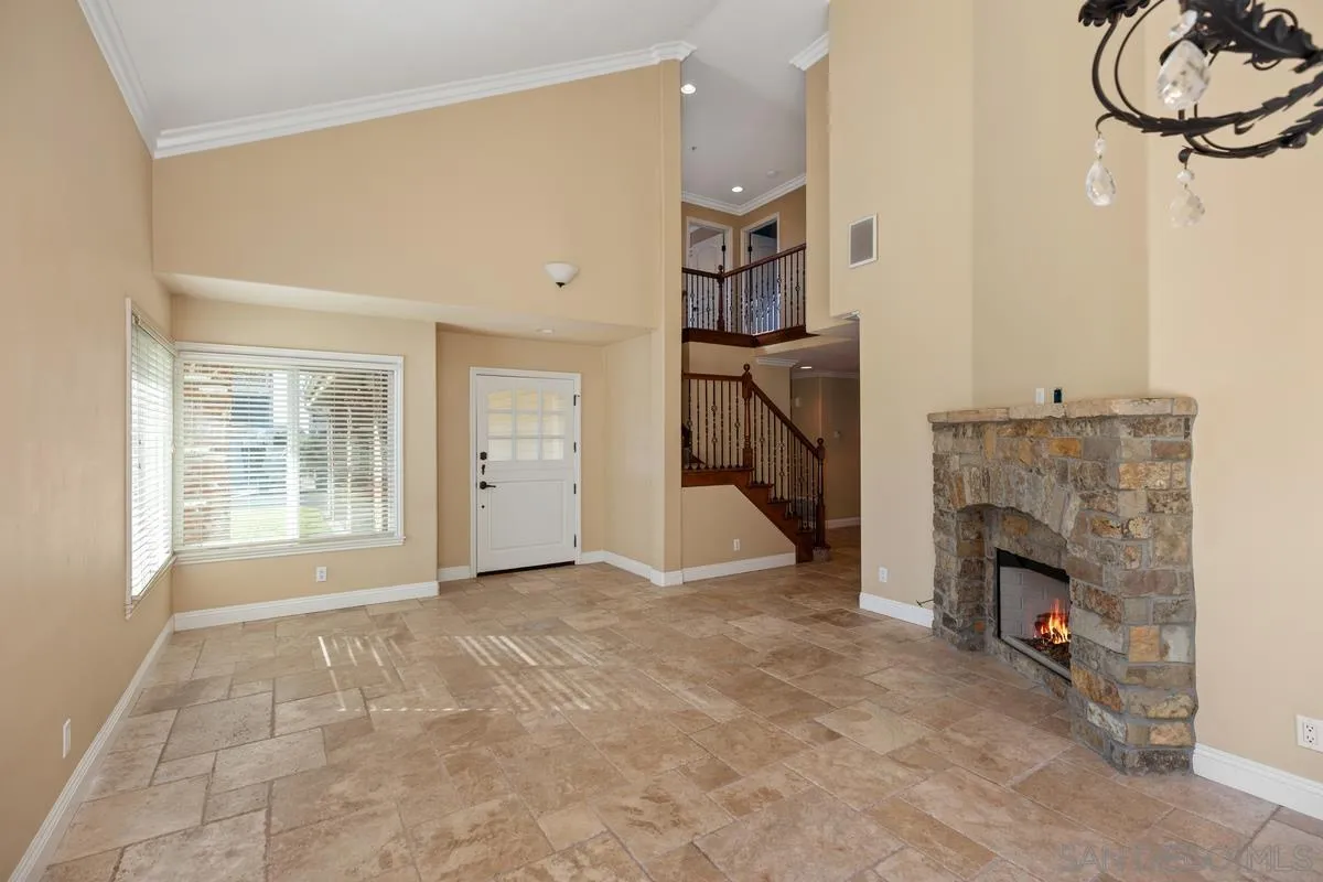 2002 Paseo Laro San Clemente, CA 92673 - Photo 10 of 37 a view of an empty room with a fireplace and a window