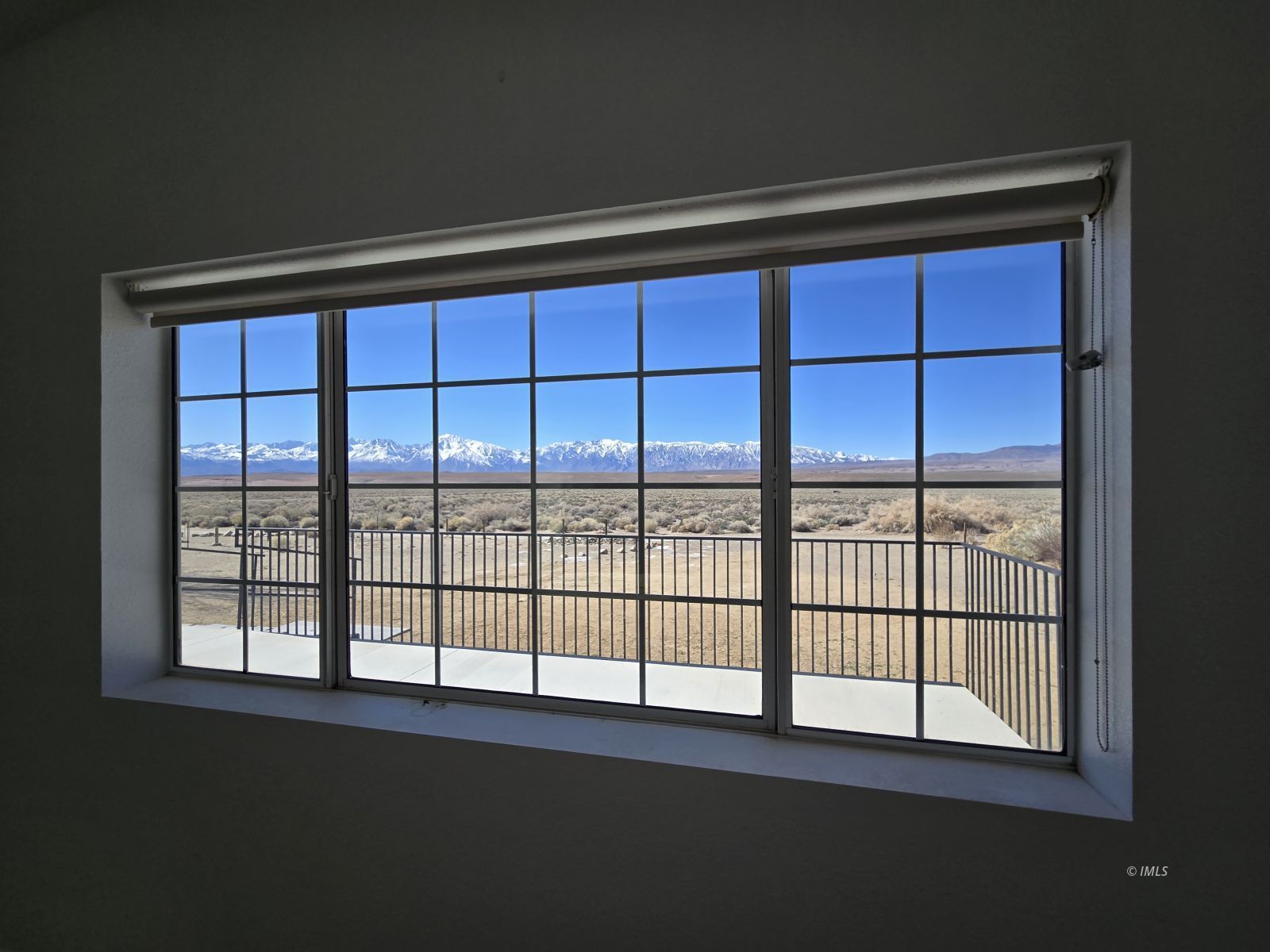 75 Sequoia Street Bishop, CA 93514 - Photo 14 of 21 a view of empty room with windows