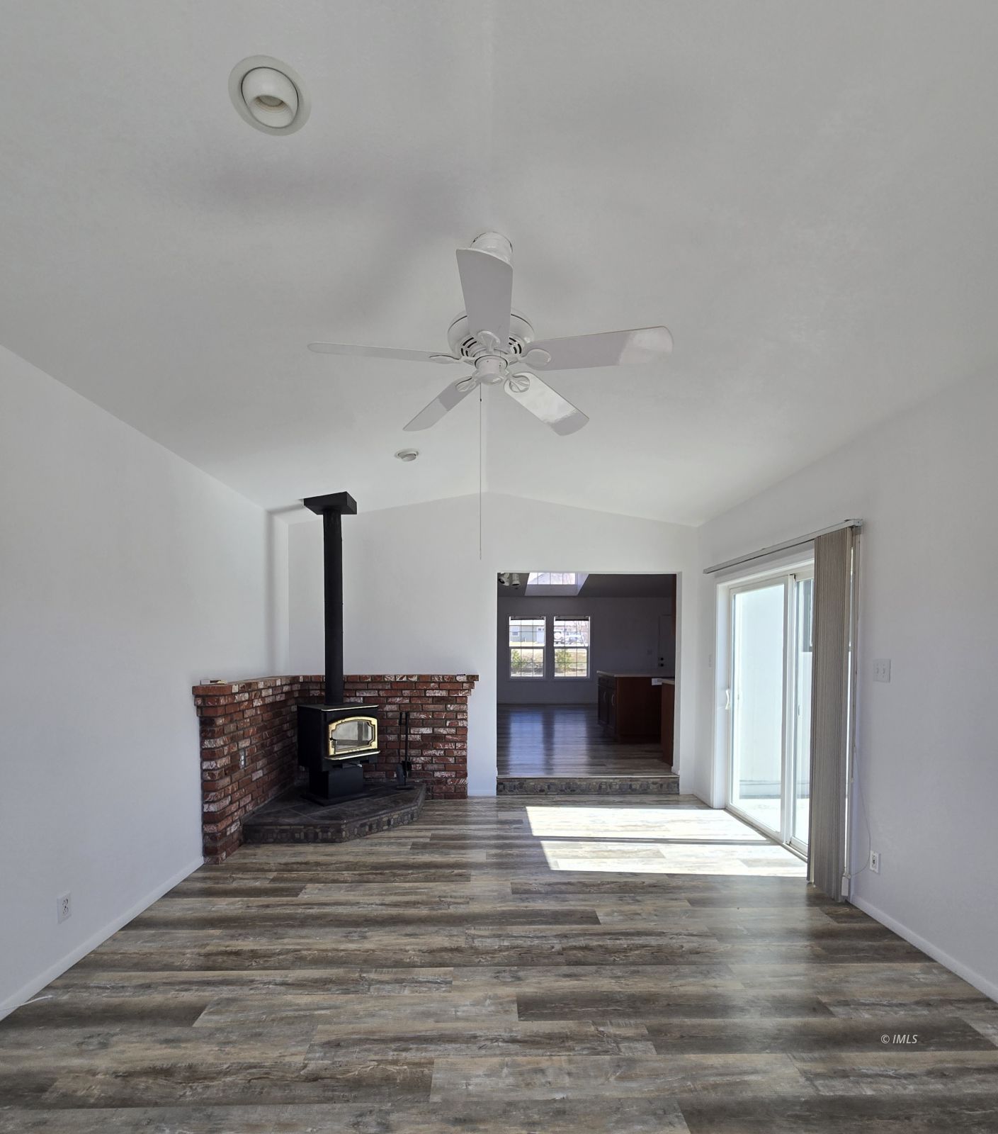 75 Sequoia Street Bishop, CA 93514 - Photo 15 of 21 a living room with furniture and a fireplace