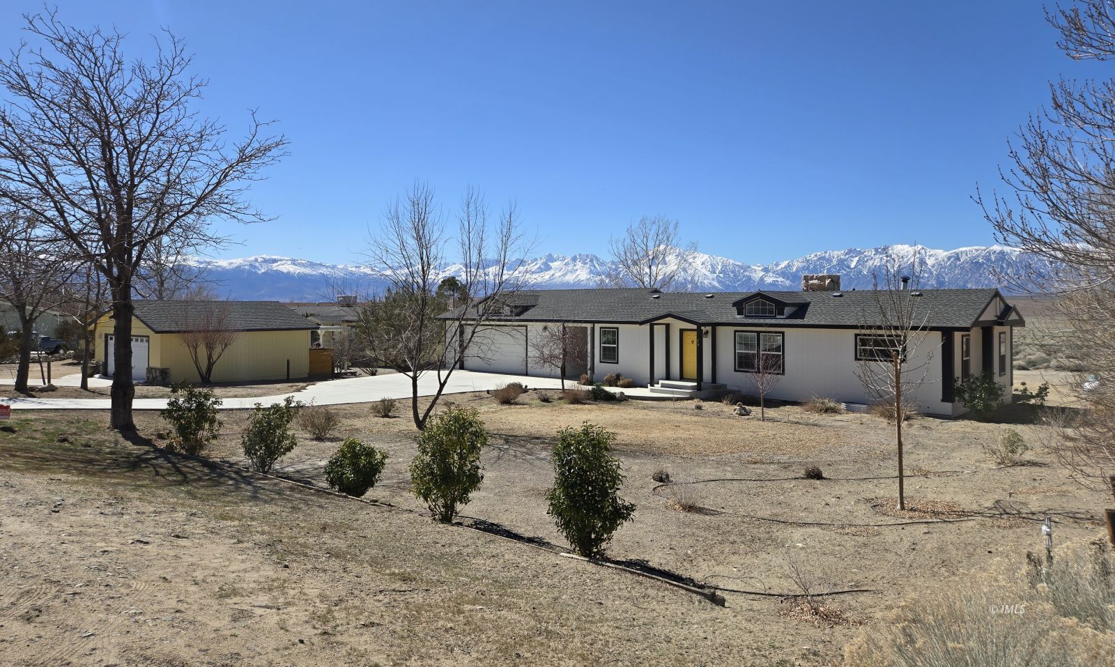 75 Sequoia Street Bishop, CA 93514 - Photo 21 of 21 a view of a house with a yard covered in snow
