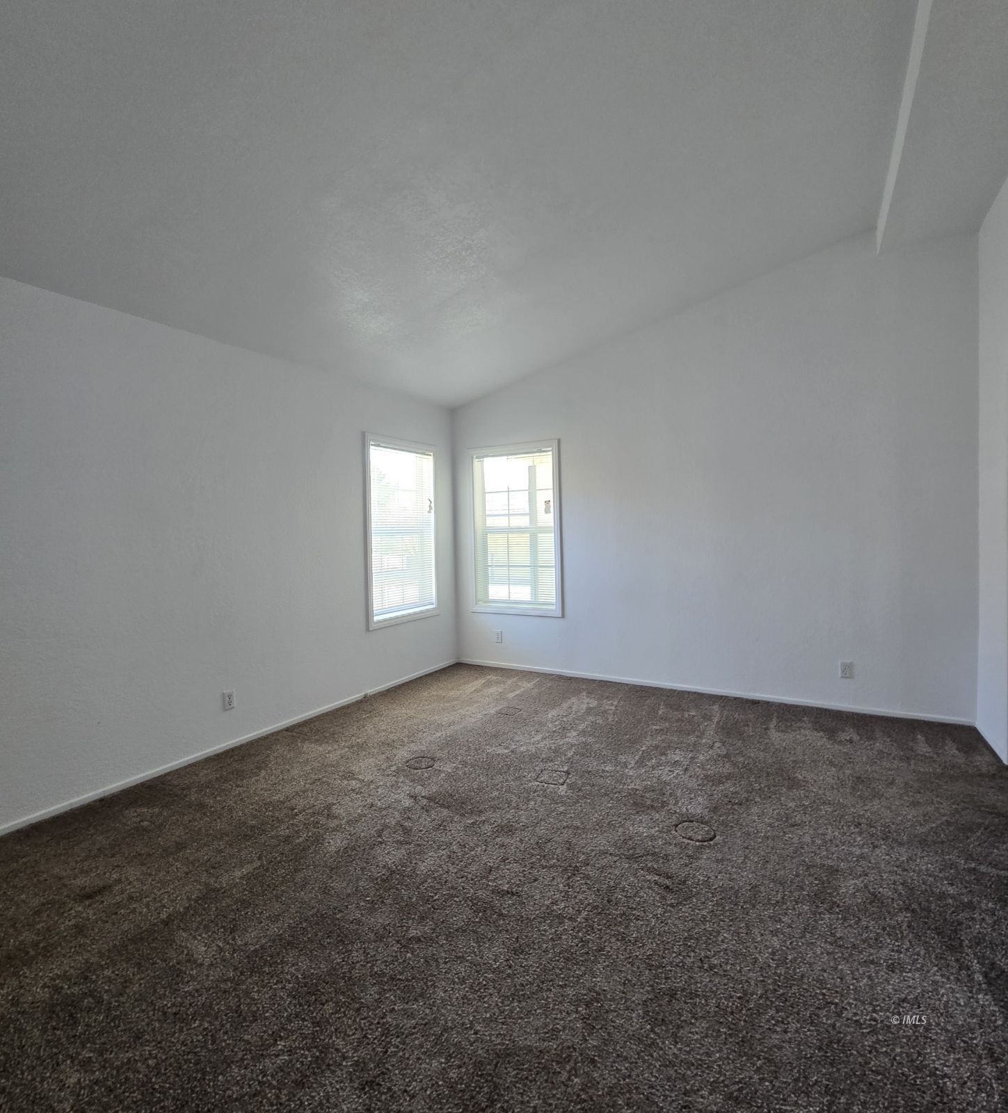 75 Sequoia Street Bishop, CA 93514 - Photo 10 of 21 an empty room with windows
