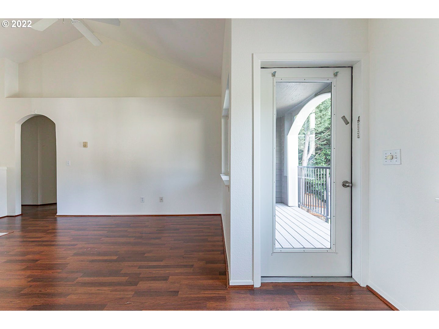 5225 Jean Road, Unit 207 Lake Oswego, OR 97035 - Photo 11 of 29 a view of an empty room and wooden floor