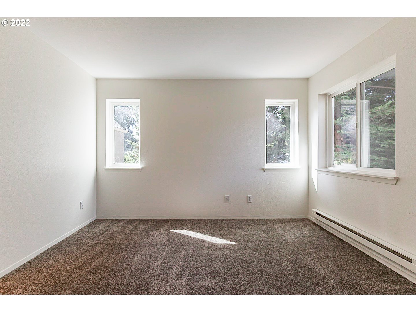 5225 Jean Road, Unit 207 Lake Oswego, OR 97035 - Photo 15 of 29 an empty room with windows