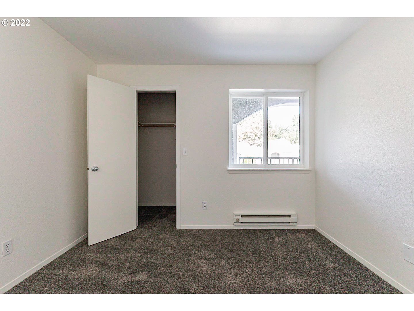 5225 Jean Road, Unit 207 Lake Oswego, OR 97035 - Photo 18 of 29 an empty room with a window