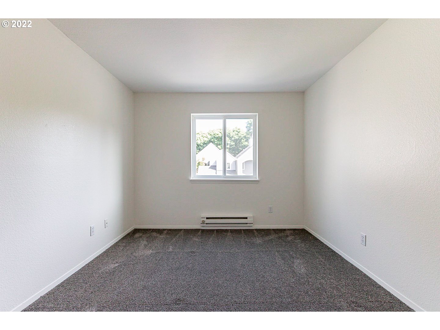 5225 Jean Road, Unit 207 Lake Oswego, OR 97035 - Photo 21 of 29 an empty room with windows