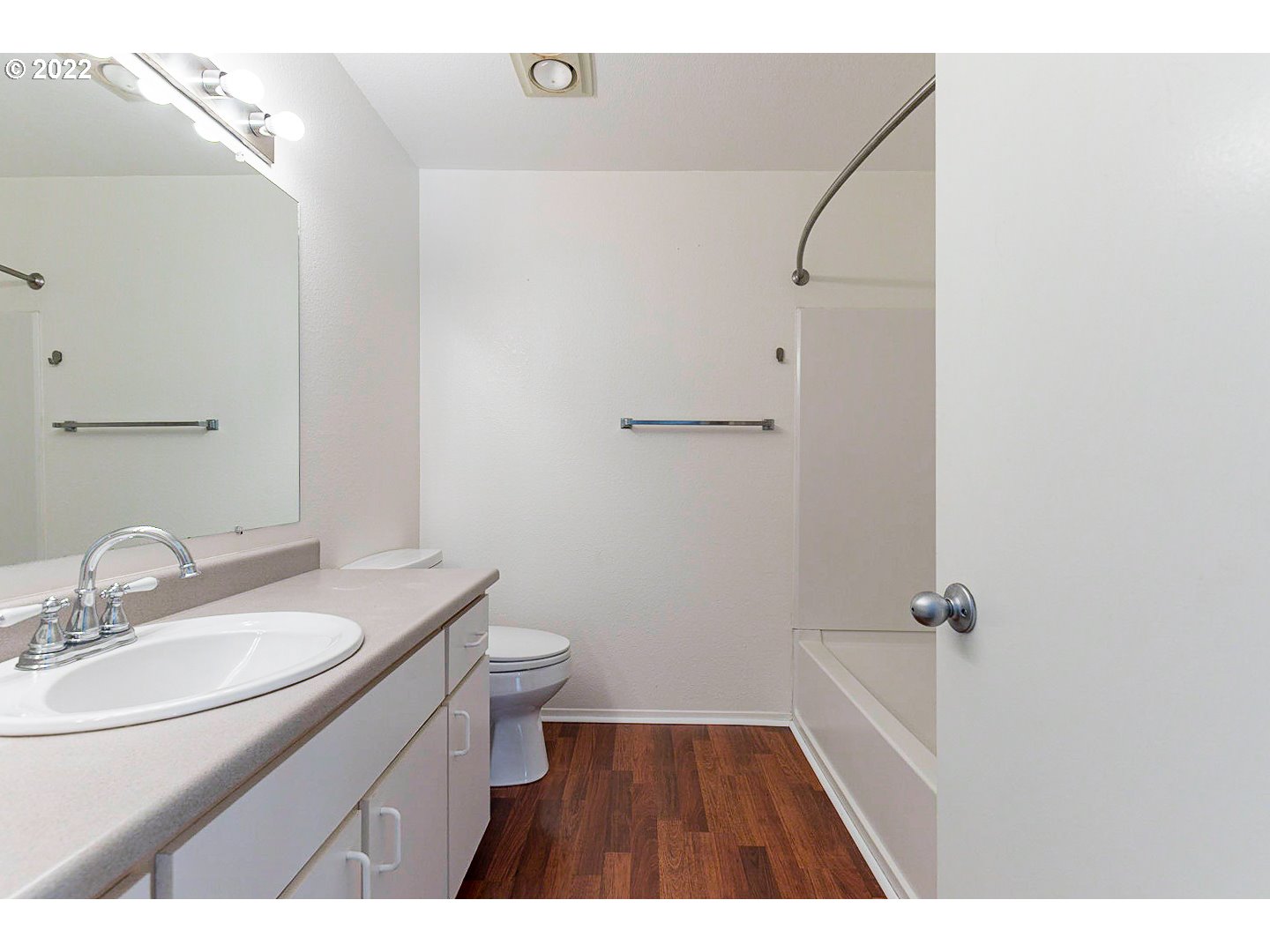 5225 Jean Road, Unit 207 Lake Oswego, OR 97035 - Photo 24 of 29 a bathroom with a granite countertop sink toilet a mirror and shower