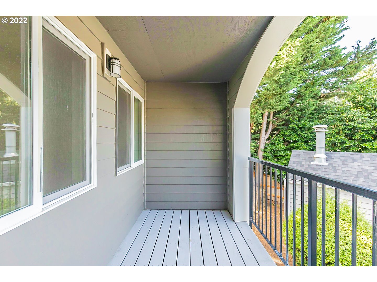 5225 Jean Road, Unit 207 Lake Oswego, OR 97035 - Photo 27 of 29 a view of balcony with wooden floor