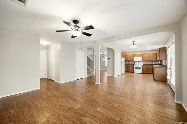 a view of a kitchen with a sink and a kitchen counter top space
