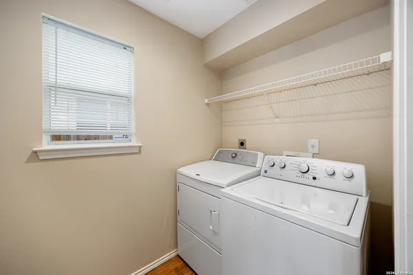 a utility room with dryer and washer